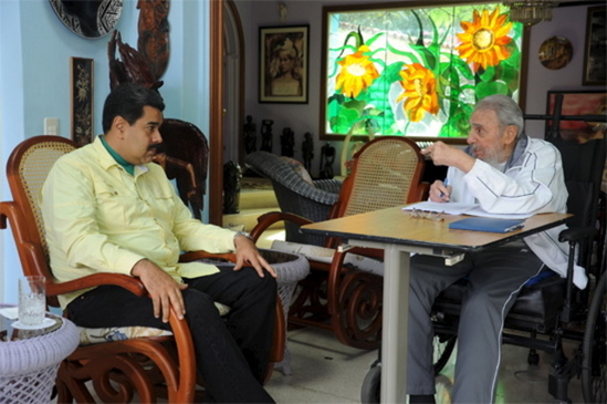 Cuba's former President Fidel Castro (R) and Venezuela's President Nicolas Maduro meet in Havana in this undated picture provided by Cubadebate on March 20, 2016.  REUTERS/Estudios Revolucion/Cubadebate/Handout via Reuters. ATTENTION EDITORS - THIS PICTURE WAS PROVIDED BY A THIRD PARTY. REUTERS IS UNABLE TO INDEPENDENTLY VERIFY THE AUTHENTICITY, CONTENT, LOCATION OR DATE OF THIS IMAGE. THIS PICTURE IS DISTRIBUTED EXACTLY AS RECEIVED BY REUTERS, AS A SERVICE TO CLIENTS. FOR EDITORIAL USE ONLY. NOT FOR SALE FOR MARKETING OR ADVERTISING CAMPAIGNS. - RTSBBC9