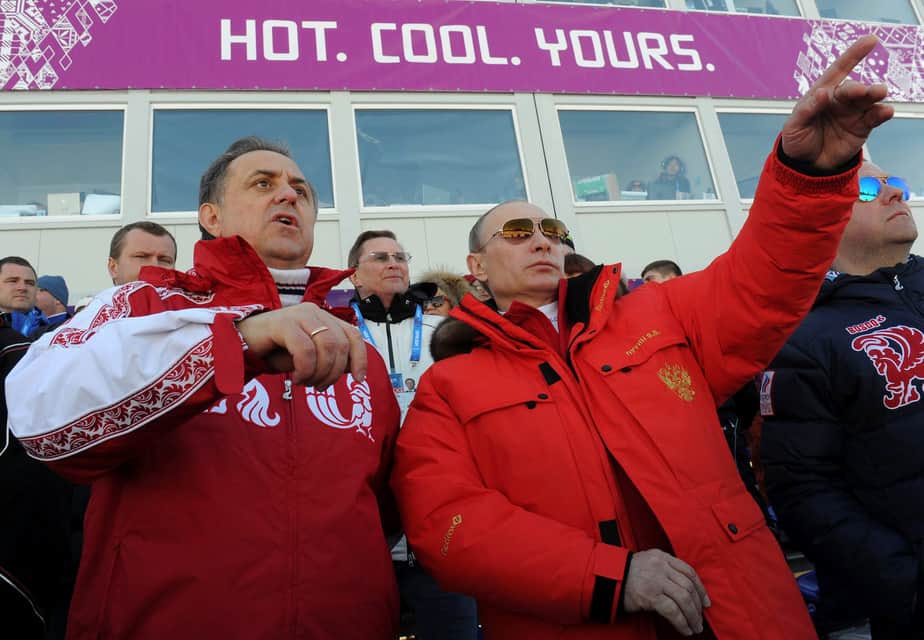 Russian President Vladimir Putin (C) and Sports Minister Vitaly Mutko (L) watch the cross country skiing men's relay during the Sochi 2014 Olympic Winter Games at Laura Cross-Country Ski and Biathlon Center near Krasnaya Polyana, Russia, February 16, 2014. To match story SPORT-DOPING/RUSSIA-MUTKO Sputnik/Kremlin/Mikhail Klimentyev/via REUTERS/File Photo ATTENTION EDITORS - THIS IMAGE WAS PROVIDED BY A THIRD PARTY. EDITORIAL USE ONLY.     TPX IMAGES OF THE DAY      - RTSIZP8