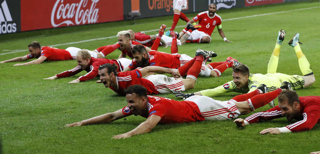 Football Soccer - Wales v Belgium - EURO 2016 - Quarter Final - Stade Pierre-Mauroy, Lille, France - 1/7/16
Wales players celebrate at full time
REUTERS/Carl Recine
Livepic - RTX2JBA5
