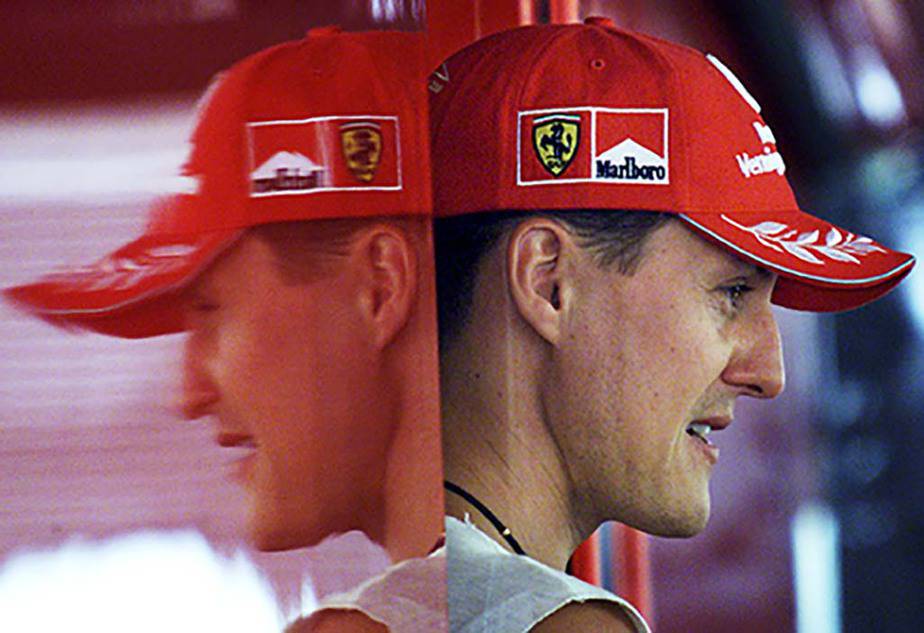 POY - YEAREND PICTURES 2001 - German Ferrai driver Michael Schumacher's
reflection is seen in Ferrari's motorhome at Hungaroring on August 19,
2001. Schumacher went on to take his fourth Drivers' Championship title
and taking his career total of wins up to a record-breaking 53 Grand
Prix. REUTERS/str

AS - RTR14VEL