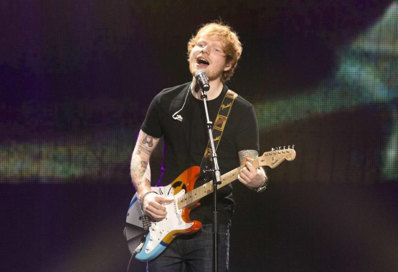 Recording artist Ed Sheeran performs during KIIS FM's Jingle Ball 2014 at Staples Center in Los Angeles, California December 5, 2014. REUTERS/Mario Anzuoni