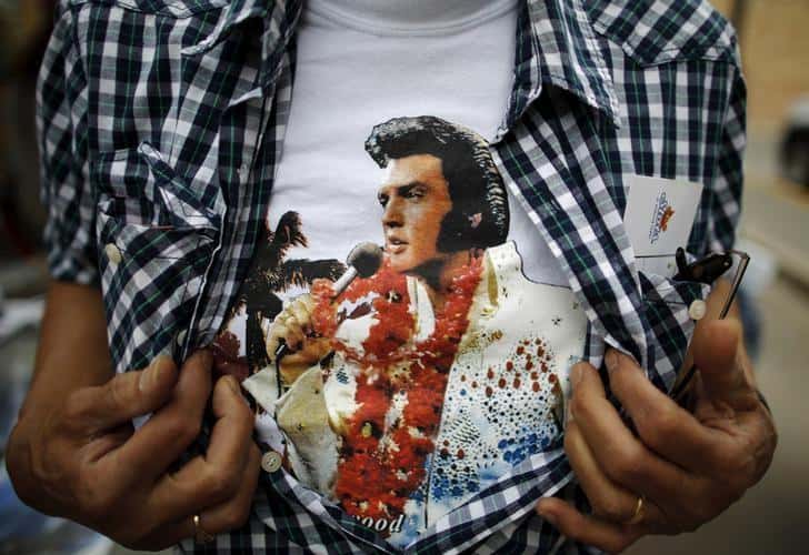 An Elvis Presley fan shows his T-shirt at the four-day Collingwood Elvis Festival in Collingwood, Ontario July 25, 2015. REUTERS/Chris Helgren