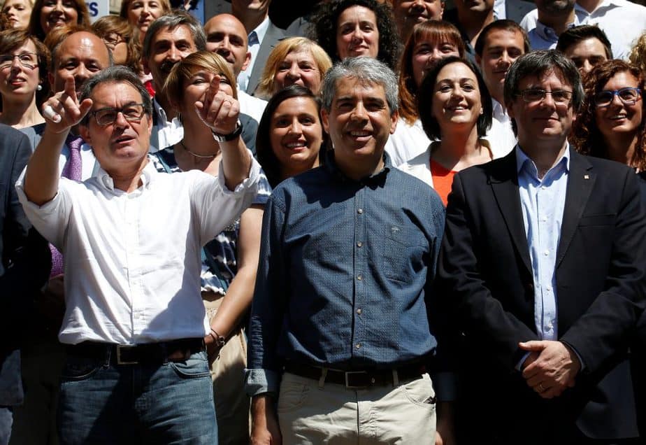 Artur Mas, Francesc Homs y Carles Puigdemont.  FOTO: Reuters