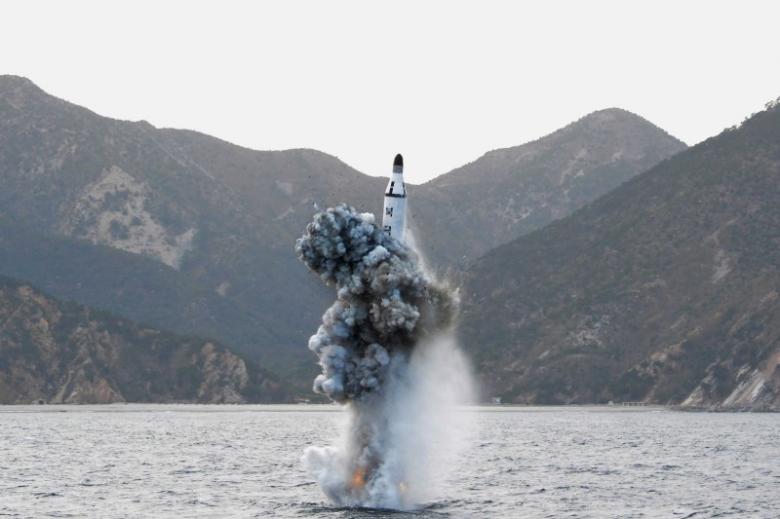 North Korean leader Kim Jong Un guides on the spot the underwater test-fire of strategic submarine ballistic missile in this undated photo released by North Korea's Korean Central News Agency (KCNA) in Pyongyang on April 24, 2016. KCNA/via REUTERS.