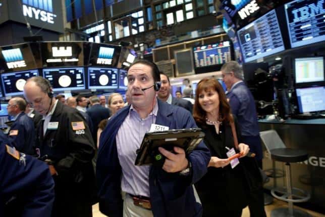 Traders work on the floor of the New York Stock Exchange (NYSE) in New York City, U.S., June 10, 2016. REUTERS/Brendan McDermid