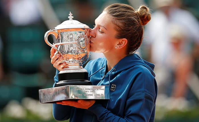 Tennis - French Open - Roland Garros, Paris, France - June 9, 2018   Romania’s Simona Halep celebrates with the trophy after winning the final against Sloane Stephens of the U.S.    REUTERS/Pascal Rossignol