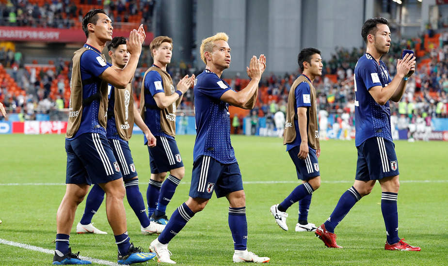 Soccer Football - World Cup - Group H - Japan vs Senegal - Ekaterinburg Arena, Yekaterinburg, Russia - June 24, 2018   Japan's Yuto Nagatomo and team mates after the match                                        REUTERS/Carlos Garcia Rawlins