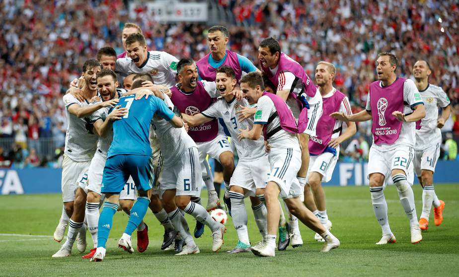Soccer Football - World Cup - Round of 16 - Spain vs Russia - Luzhniki Stadium, Moscow, Russia - July 1, 2018  Russia players celebrate winning the penalty shootout   REUTERS/Carl Recine